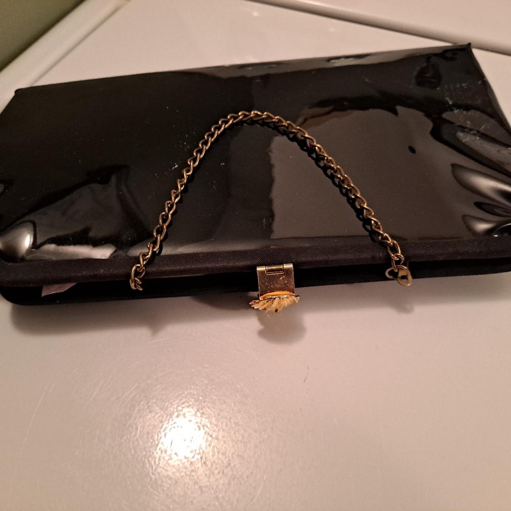 Adorable black and gold purse/ pouch.